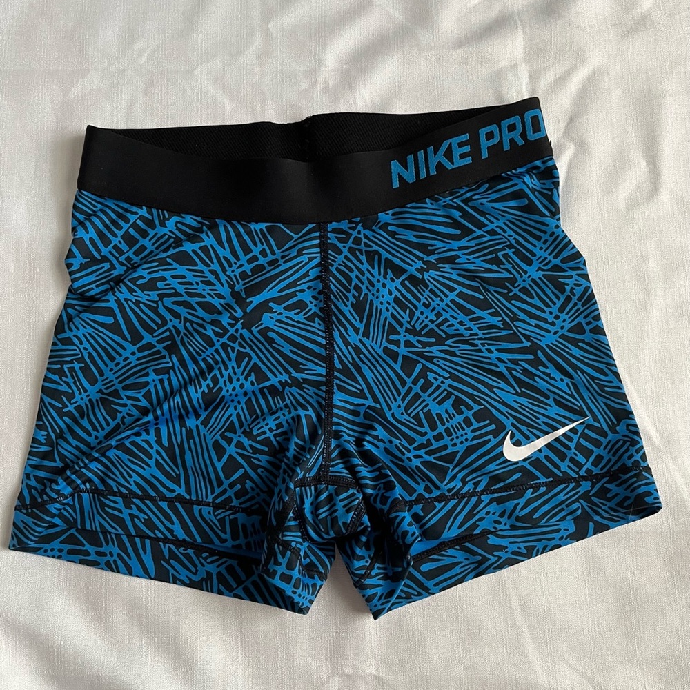 Blue and black pattern Nike pros